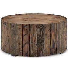 The golden leaf round coffee table represents a blend of modern style and superior craftsmanship. Beaumont Lane Round Coffee Table With Casters In Rustic Pine Walmart Canada