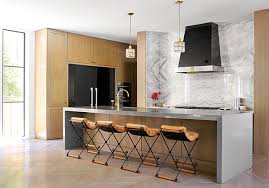 Using a tile border as an accent for a backsplash adds interest to a kitchen. 25 Of Our Most Beautiful Kitchen Backsplash Ideas House Home