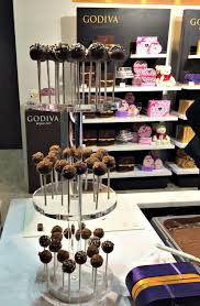 Godiva S Freshly Dipped Lollipops At Salon Du Chocolat In Brussels Godiva Chocolatier Chocolatier Belgian Chocolate