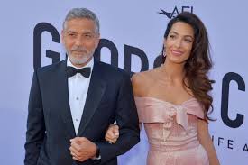 Actor and director george clooney waves next to his wife amal as they leave the hotel. Watch George Clooney Says Life Was Empty Before Wife Amal Their Kids Upi Com