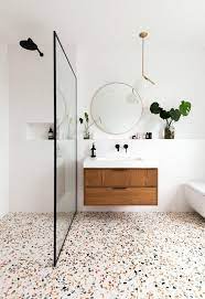 Open shelving against a reclaimed brick backsplash is brightened up with recessed lighting. Inspiration Modern Terrazzo Design Ann Cox Design Interior Design In Tampa