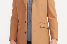 International concepts will add sleek sophistication to any look. Camel Wool Blend Top Coat