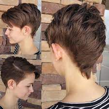 Modern Textured Faux Hawk With Side Swept Bangs And Brunette Color The Latest Hairstyles For Men And Women 2020 Hairstyleology Faux Hawk Hairstyles Short Hair Styles Womens Hairstyles