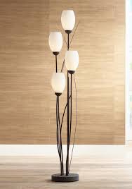 Black Metal And White Glass Tulip 4 Light Floor Lamp U2560 Lamps Plus Stylish Floor Lamp Modern Floor Lamps Floor Lamp Brighten a living room, bedroom, or family room with the generous overall lighting of this striking torchiere style floor lamp.