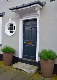 It's not a big house, so you can see the doors from many. Front Of House Colours Colors For Front Doors Grey Front Door Katie French Furnit House Paint Exterior Exterior Paint Colors For House House Front Door