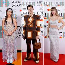 If you're experiencing turbulence or pressure, that probably means you're rising, taylor swift said in an empowering speech tuesday as she made history. Best Dressed Stars At The Brits 2021 Dua Lipa Harry Styles Taylor Swift More Hello