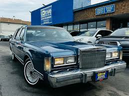 Image result for Light Ice Blue 2006 Town Car