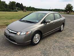 Car Brand Auctioned Honda Civic Hybrid Sedan 4 Door No Reserve Tan 2006 Honda Civic Hybrid Sedan Only 125k M Honda Civic Hybrid 2006 Honda Civic Honda Civic