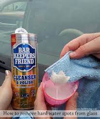How To Remove Hard Water Spots From Glass Daddy By Day Hard Water Spots Water Spots Clean Baking Pans