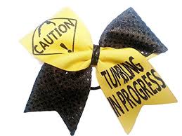 Black hair which by nature is more course, tends to grab better than lower quality white hair. Cheer Bows Yellow And Black Sequin Caution Tumbling In Progress Hair Bow Buy Online In Angola At Angola Desertcart Com Productid 35851847