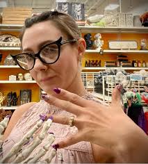 Matching nails and skeleton hand design