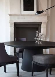 10 Striking Black Dining Tables For Your Modern Dining Room Black Round Dining Table Dining Table Black Minimalist Dining Room