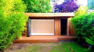 A 5 2m X 5 0m Garden Room With Concealed Storage In Teddington Middlesex Extras Large Verand Garden Room Garden Lodge Beautiful Gardens Landscape