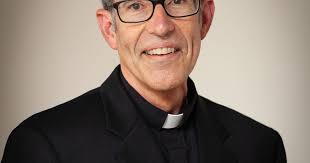 New priest retired from USFS