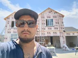 Siding was installed first. Before roofing a push to get the project done  by builders cost the company again.