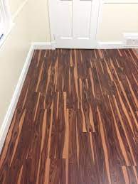 Trafficmaster African Wood Dark 6 In W X 36 In L Luxury Vinyl Plank Flooring 24 Sq Ft Case 57111 0 The Home Depot Wood Floors Wide Plank Flooring Old Wood Floors