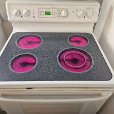 Nice & Clean G.E Brand White In Color Glasstop Electric Self Cleaning  Stove. Good Working Unit.