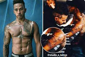Apparently, the inspiration for the giant tattoo was attributed to the late rapper tupac. Lewis Hamilton Has Time On His Hands And Arm As F1 Champion Enjoys Break With New Tattoos