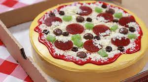 (to test, carefully pull up parchment paper to raise pizza cake out of pan.) once completely baked, cool in pan 5 minutes. How To Make A Cake Pizza Nerdy Nummies Youtube