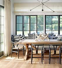 In this contemporary family room a fabric valance flanked by a pair of stationary panels frame the sliding door which opens out to the pool deck and garden. 13 Stylish Window Treatment Ideas For Sliding Doors Better Homes Gardens