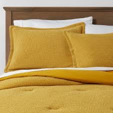 Don't be afraid to add some color to your white bedroom. Gold Bedding Sets Target