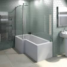 Here is an l shaped shower bath with glass panel, we added a strip of tiles behind the bath as a feature and to break up the colour of the tiles. Bathroom Ideas L Shaped Bath Shower Bath L Shaped Bath Bath Screens