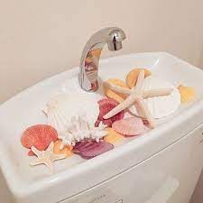 生活感にサヨナラしよう トイレをおしゃれに彩るアイディアいろいろ キナリノ サーフ インテリア ハワイアンインテリアdiy 西海岸 インテリア トイレ