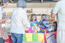 You can also use the garage as a storage room since it offers ample space for cleaning items. Kids Having A Garage Sale Zef004885 Zerocreatives Westend61
