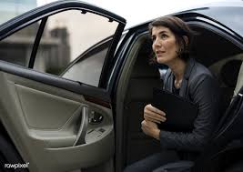 Download Premium Image Of Businesswoman Going Out Of Her Car 28155 Business Women Town Car Service Car