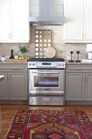 Two color painted kitchen cabinets. Before And After Kitchen Renovation Painting Kitchen Cabinets Kitchen Cabinets Makeover