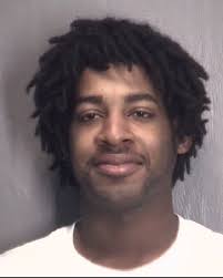 Two women charged in armed robbery