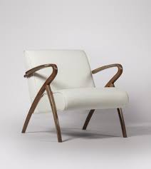 Wooden armchair are also offered with features such as extra footrests, and adjustable height. Sherborne Scandi Armchair In Natural Mango Wood Beige Swoon
