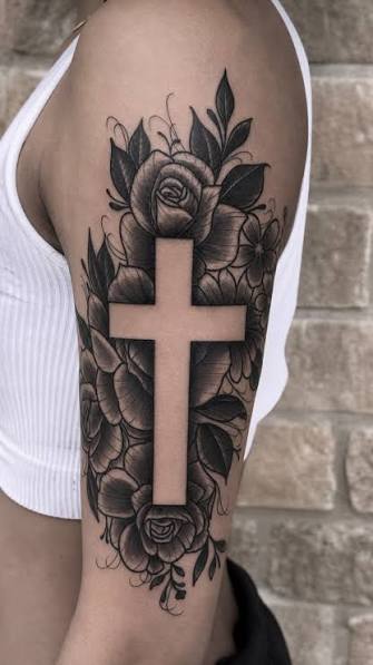 Negative Space Cross Tattoo Designs