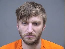 Father and son answer charges to a beating and robbing in Youngs