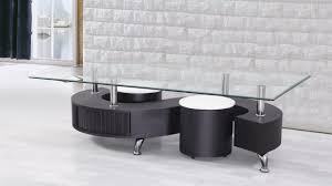Pour river rocks into the recessed top of the coffee table. S Shaped Wengue Wood Glass Coffee Table Homegenies