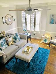 Grey purple living room greg natale a regular advocate of highly pigmented schemes strikes again with this mature take on living room colour. Glam Teal And Gray Living Room Teal Living Room Decor Living Room Turquoise Teal Living Rooms