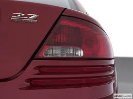 Image result for Dark Garnet Red 2001 Stratus