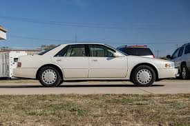 Image result for Black Sapphire 1993 Seville