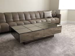 4.6 out of 5 stars 39. Bevelled Bronze Mirror Coffee Table Klarity Glass Furniture