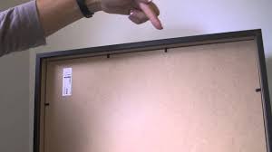 Ask somebody to help you straighten it because once you stuck it, you can no longer. How To Hang Pictures Without Wire Getting Crafty Youtube