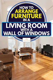 Arrange tables, storage cabinets and ottomans. How To Arrange Furniture In A Living Room With A Wall Of Windows Home Decor Bliss