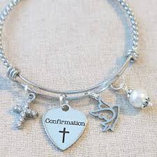 Most confirmandi will pick a patron saint name as their confirmation name making patron saint rosaries or patron saint pendants an ideal Amazon Com Confirmation Gift Girls Confirmation Charm Bracelet Religious Cross Jewelry Religious Dove Charm Bracelet Confirmation Sponsor Gift Handmade