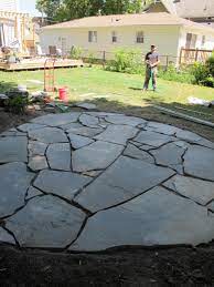 Unfortunately, this only serves to further confuse the issue. How To Install A Flagstone Patio With Irregular Stones Diy Network Blog Made Remade Diy