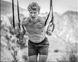 Inside The Masochistic Mind Of The Top Obstacle Racer On The Face Of The Planet Hunter Mcintyre And Ben Greenfield Beach Essentials Men S Fitness Spartan Race