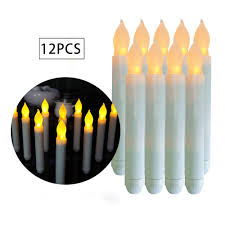 Amazon Com Advocator 12 Pcs Dripless Battery Operated Led Flameless Taper Candles With Yellow Mini Flickering Taper Fake Candles For Christmas Decorative Church Wedding Window Holiday Wall Sconce Home Kitchen