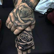 Black and grey roses drawing at getdrawingscom free for personal. 42 Totally Awesome Black Rose Tattoo That Will Inspire You To Get Inked Spiritustattoo Com Black Rose Tattoos Rose Hand Tattoo Rose Tattoos For Men