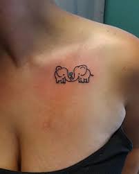 Mom and baby silhouette tattoo. Small Motherhood Tattoos Popsugar Family