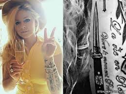 Lavigne captioned the set of photos, rocking out with her band and boyfriend, mod sun, who she worked on the song with. Avril Lavigne S Tattoos Meanings Steal Her Style