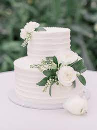 Check spelling or type a new query. Simple And Elegant White Wedding Cake With White Flowers And Accent Greenery Captured By Lauren Wedding Cake Greenery Winter Wedding Cake Wedding Cake Toppers