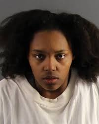 Police arrest two after woman, fatally shot Sunday, is city's 20th homicide